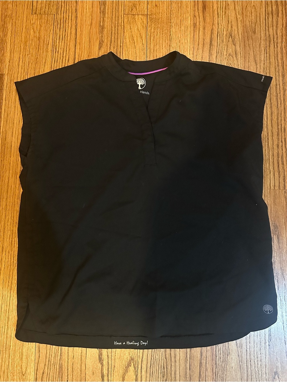 Healing Hands Women’s Medical Black Scrub Top with Subtle Logo